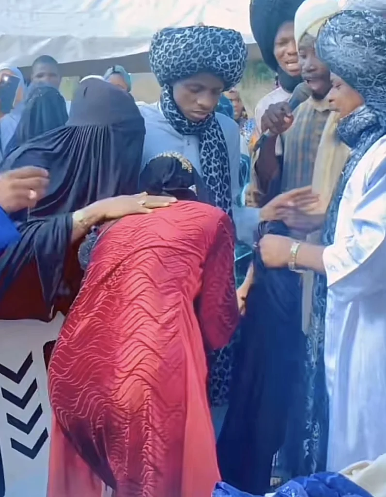 “Na by force” — Netizens ask as Muslim lady breaks down in tears during her jilbab ceremony