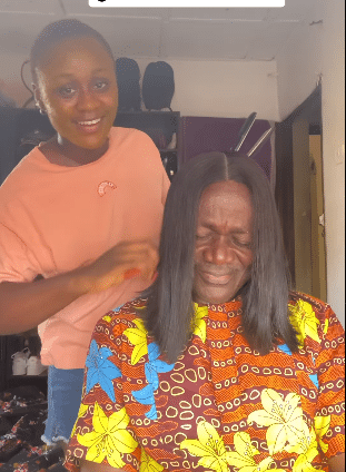 Lady shares dad’s reaction as she uses his head to stretch her wig