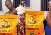 Lady organizes photoshoot with bag of rice due to soaring cost
