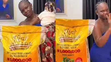 Lady organizes photoshoot with bag of rice due to soaring cost