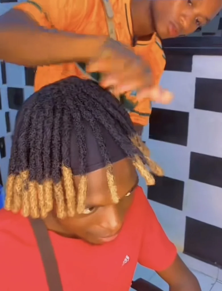 Man steps up his hair game with new dreadlock wig