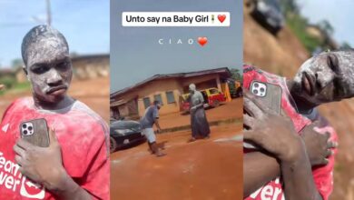 Nigerian father, friends, and neighbors celebrate birth of baby girl with street dance and powder bath