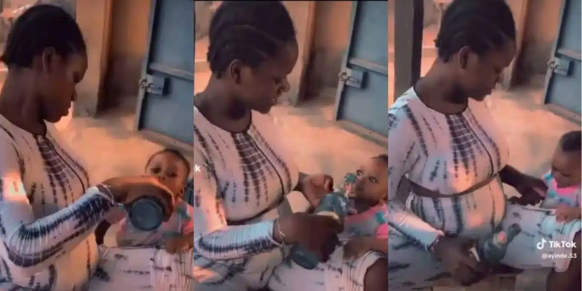 Netizens outraged as lady feeds beer to her little baby