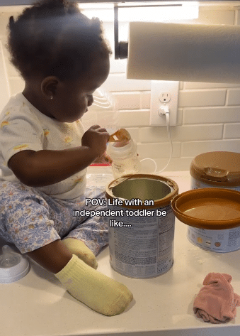 Mother in shock after entering the kitchen only to find her little daughter preparing her own meal herself
