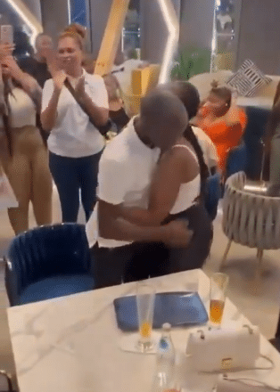 lady proposes to man restaurant