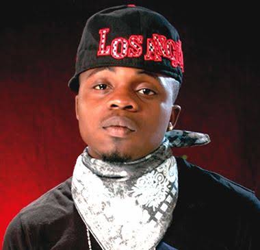 Fans pay tribute to Dagrin at burial ground 14 years after death