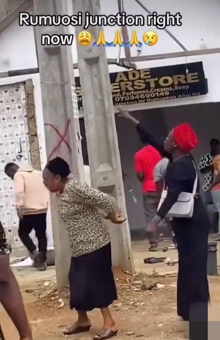 Christian women praying fire building 