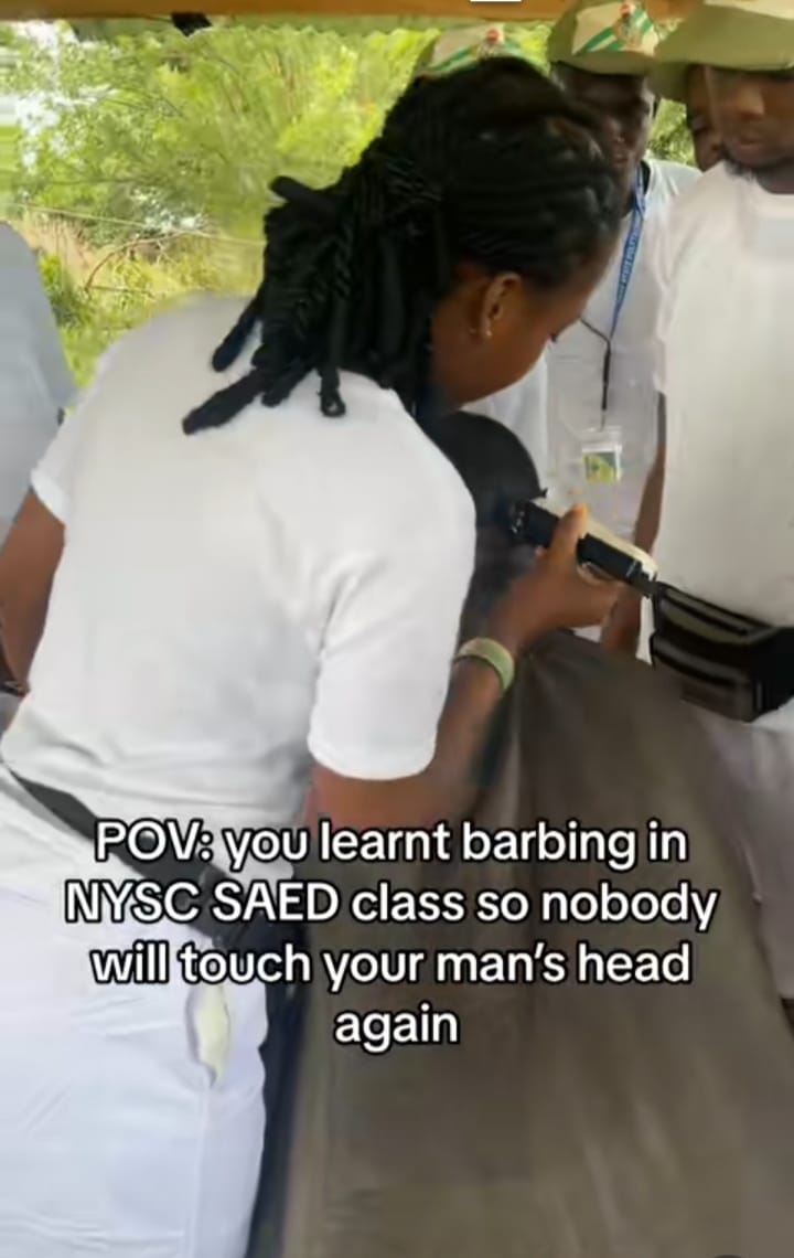 Female corper wows colleagues as she shows off impressive barbing skills during SAED class