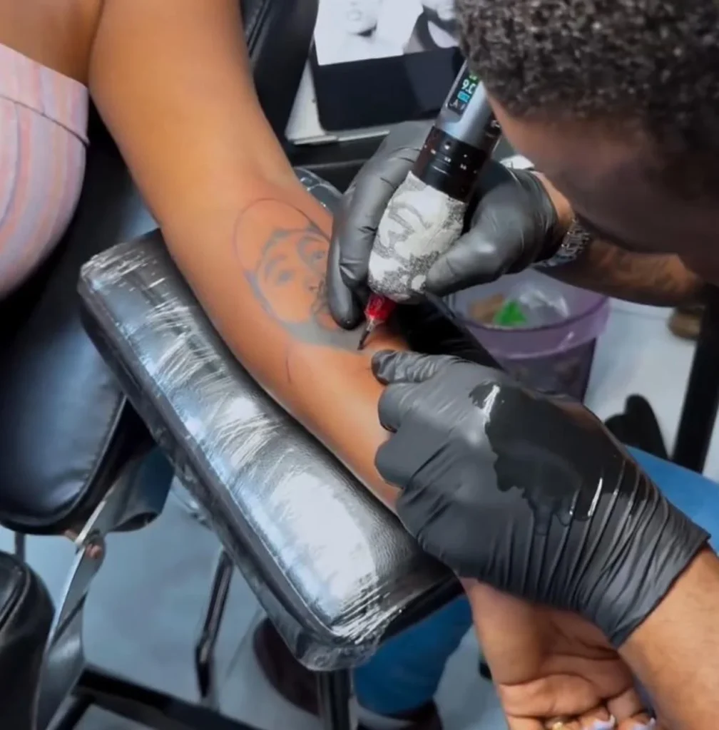 Lady gets tattoo of Davido and Chioma to celebrate their wedding