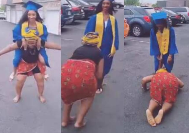 Excited mother dances barefooted as daughter graduates from school