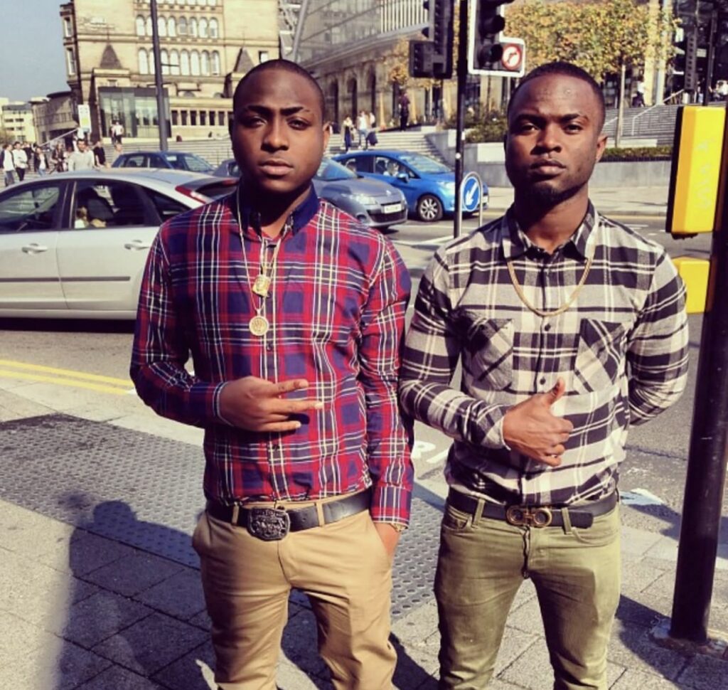 Davido gifts his aide a brand new luxury car