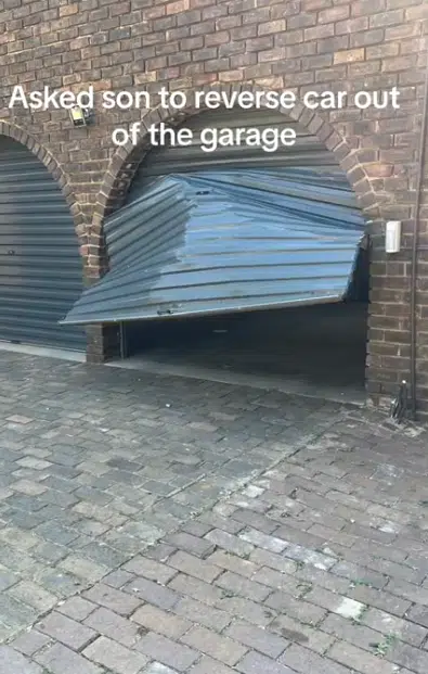 Moment son asked to reverse Mercedes-Benz, crashes it through garage door and wall