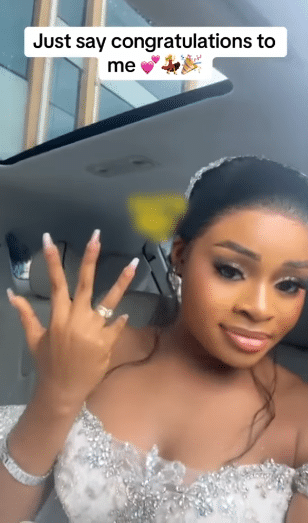 Bride taunts naysayers as her man wifes her up, despite their gossips