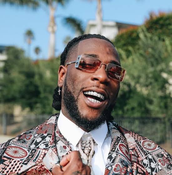 Portable begs for feature as Burna Boy rewards him after knocking out Speed Darlington in boxing match