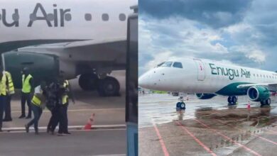 Drama as man is dragged off plane by airport staff