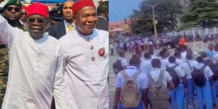 Primary & secondary school students gather on main road to welcome Tinubu in Imo State
