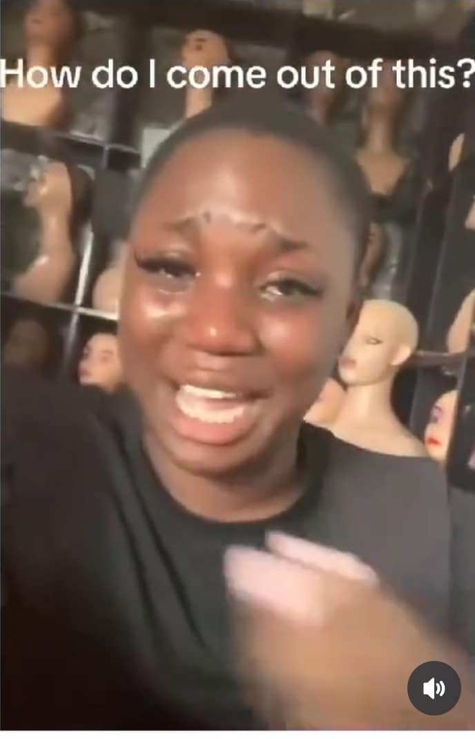 Lady cries as thieves cart away luxury wigs worth millions from her hair shop