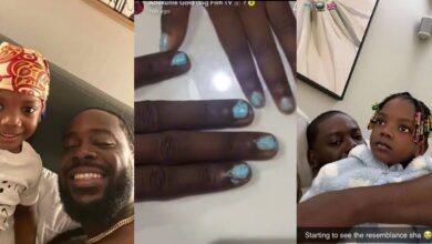 Adekunle Gold melts hearts as daughter Deja paints his nails in adorable video