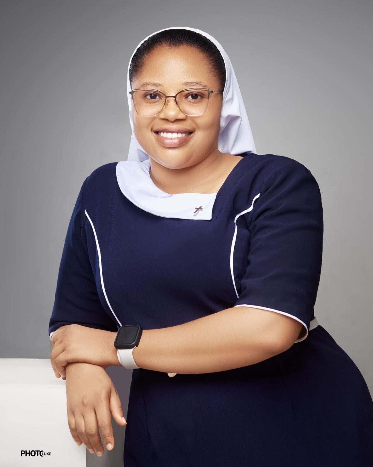 Reverend sister responds after backlash over wearing trousers in(00)