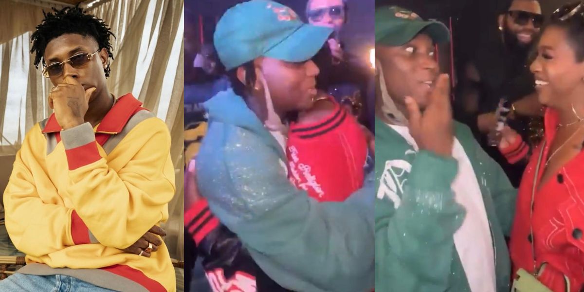 "He's always after divorced women" – Fans react as Bella Shmurda whispers to Annie Macaulay in viral event clip