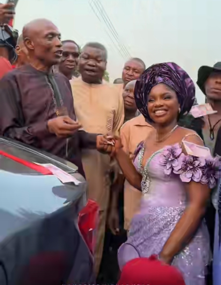 Bride overwhelmed with emotions as Dad gifts her a car on wedding day