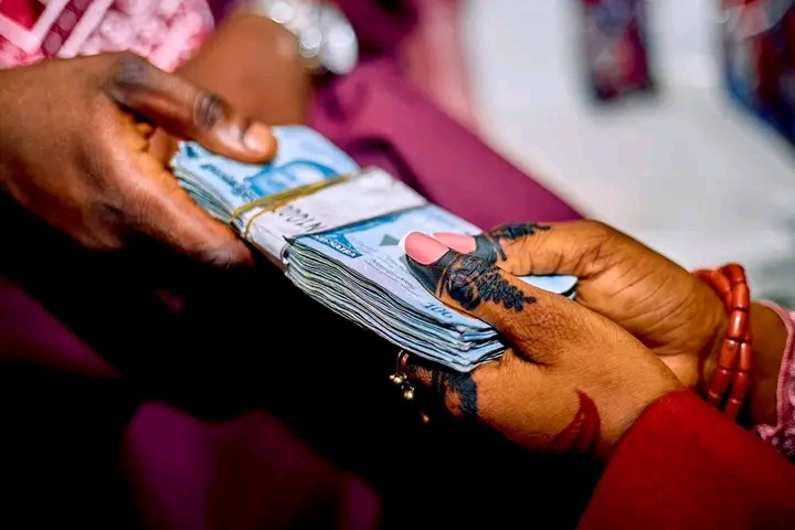 Woman takes 5 million naira note