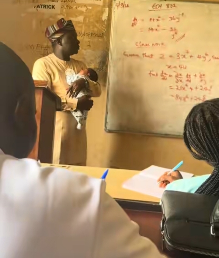 Video as lecturer carries student's baby so she can concentrate in class, Nigerians hail him 