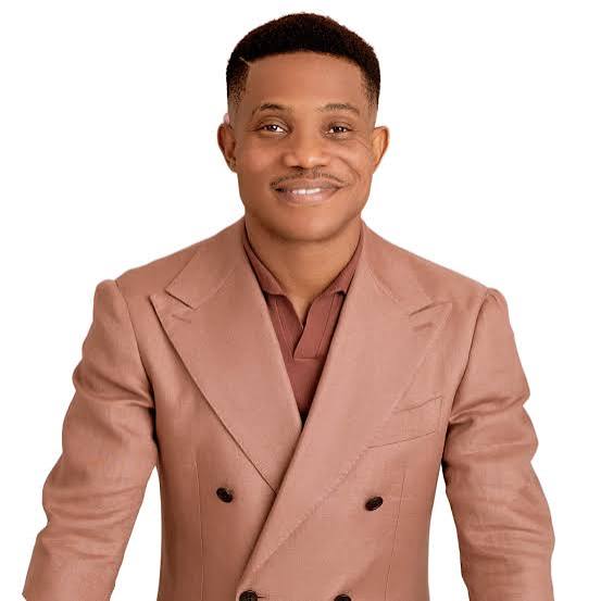 Pastor Jerry Eze gets emotional as he honors woman who sponsored his education 