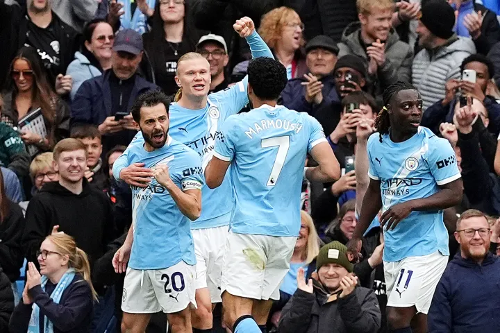 Man City close gap on Arsenal after dominant win over Brentford