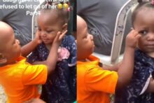 Little boy becomes fascinated by girl in church, photos spark reactions
