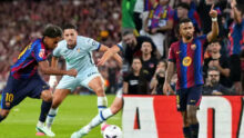Barcelona ease past Getafe to strengthen grip on La Liga summit