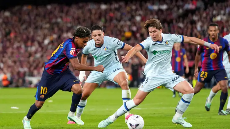 Barcelona ease past Getafe to strengthen grip on La Liga summit